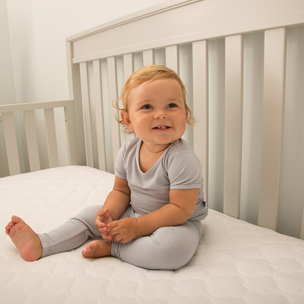 What to Look for in a Crib Mattress Pad